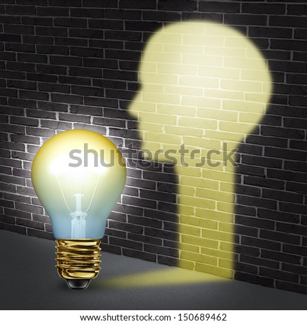 Creative communication and street smart expression with an illuminated light bulb shinning a glow shaped as a human head glowing on a brick wall as a business concept for innovation and leadership.