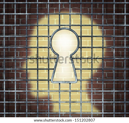 Creative freedom key with a human head light glowing on a brick wall through a prison cage opened with a keyhole shape as a business and mental health concept searching for innovative solutions.