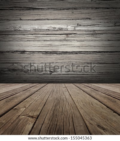 Old wood stage background with vertical natural distressed antique wooden plank floor and horizontal weathered wall as an aged grunge back drop  with copy space.