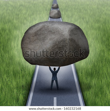Removing obstacles business concept as a businessman clearing a path to success by removing large rocks on a road that are blocking the journey as a symbol of financial guidance and freedom.