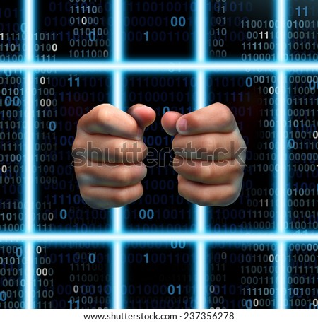 Technology prison and internet addiction victim concept as human hands holding virtual jail bars made from computer laser beams with digital binary code.