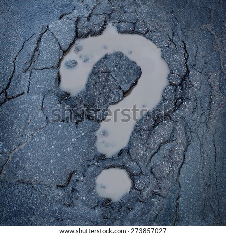 Road construction concept and city maintenance of infrastructure symbol as broken pavement or asphalt shaped as a question mark pot hole or damaged street as an icon for highway safety questions.
