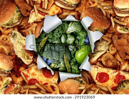 Diet lifestyle change concept and breaking out and escape from unhealthy habits of eating fatty junk food towards green vegetables and fruit as a ripped and burst hole in the paper..