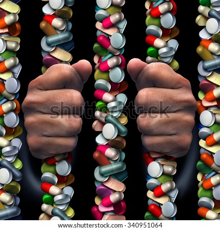 Prescription drug addiction medical concept as a group of medicine capsules and painkiller pills shaped as prison or jail bars as a health care symbol with a medication addict trapped inside.