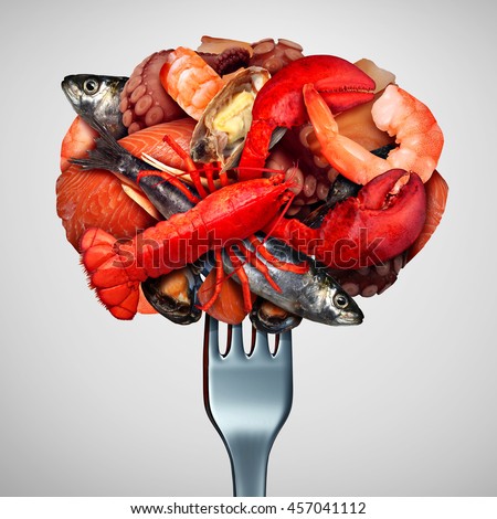 Seafood concept as a group of shellfish crustacean and fish  grouped together on a fork as a fresh meal from the ocean as lobster steamed clams mussels shrimp octopus and sardines.