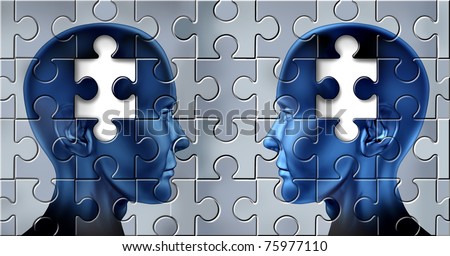 Teaching and learning concept with two human heads on an in-complete jigsaw puzzle representing the concept of education and ideas.