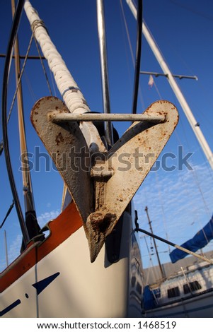 Bow of a sailboat with an anchor