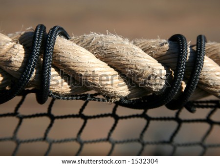 Twisted beige rope with black ties