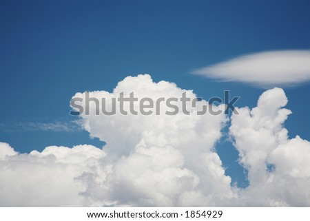 White fluffy clouds against a pretty blue sky