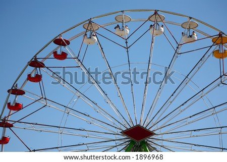 Carnival ferris wheel with clear sky