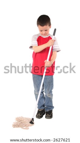 Young boy doing his chore of mopping the floor