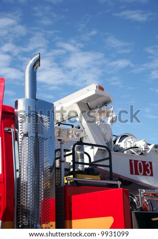 Partial fire engine with beautiful blue cloudy sky