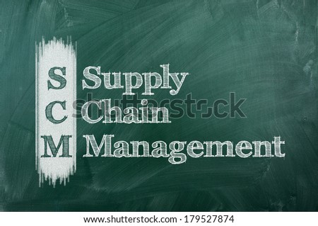 SCM Supply Chain Management  acronym written on chalkboard blackboard.