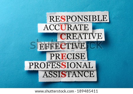 Success acronym in business concept, words on cut paper hard light