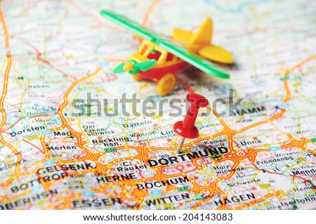 Close up of Dortmund,Germany  map with red pin and airplan - Travel concept