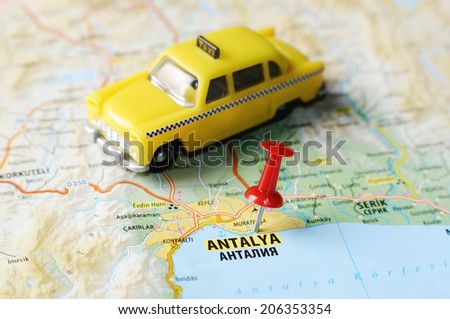 Close up of  Antalia,Turkey  map with red pin and a taxi    - Travel concept