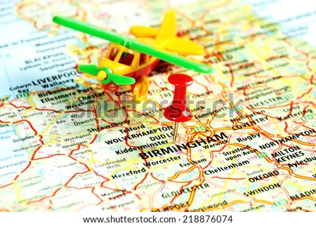 Close up of  Birmingham ,United Kingdom  map with airplane  toy and  red pin - Travel concept