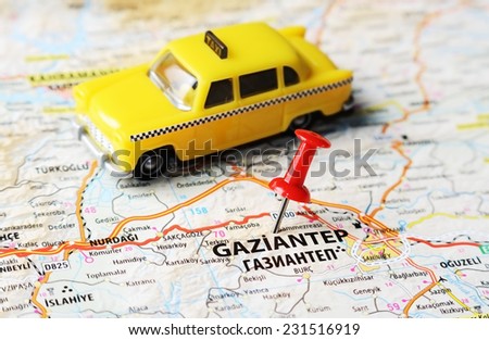 Close up of  Gaziantep ,Turkey  map with red pin and a taxi    - Travel concept