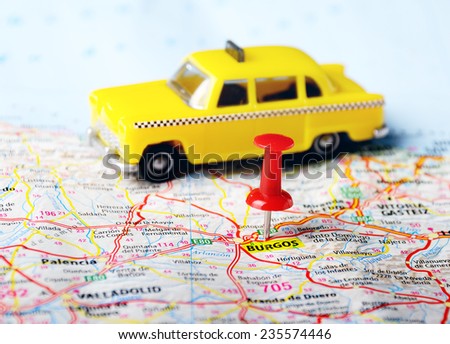 burgos  ,Spain  map ,pin  and taxi car  toy   - Travel concept