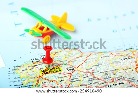 Santiago de Compostela , Spain  map and airplane toy  - Travel concept