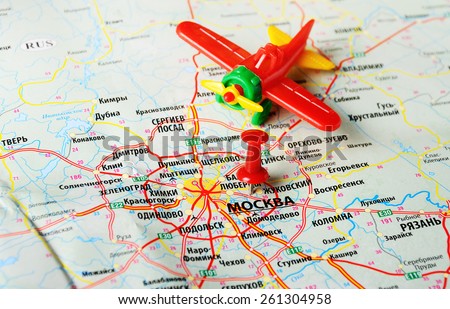 Close up of  Moscow  , Russia  map and airplane toy