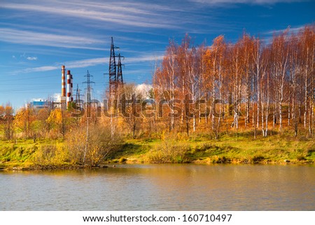 pipe on the background of the landscape and the lake