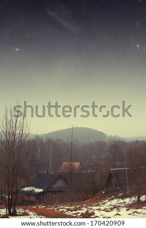 country house at night. Elements of this image furnished by NASA