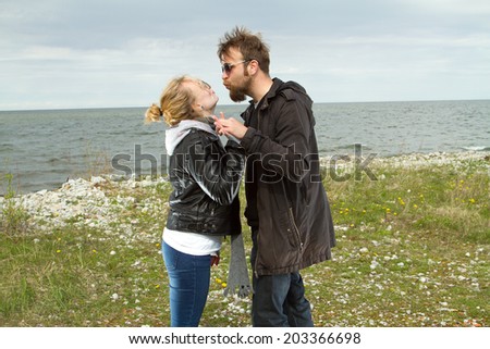 couple in love near the sea autumn. beautiful places in Europe