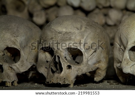 old bones and skulls in the Gothic vault of Kutna Hora. Ossuary.