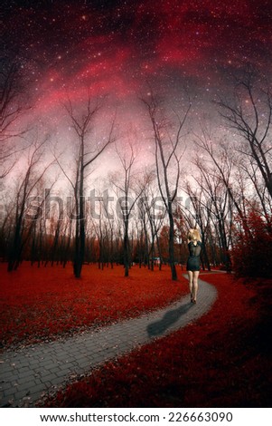 Woman enjoys the view of Europe. spring night infrared photography. Elements of this image furnished by NASA
