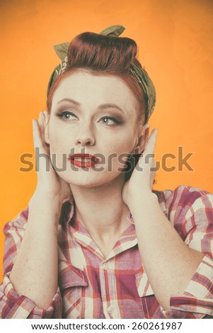 vintage retro style. Styled Smiling Woman with Retro Golden Hair Style.