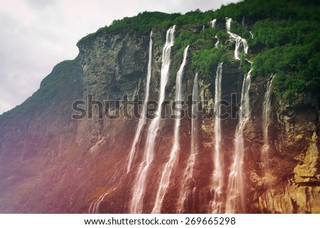Geiranger fjord, Norway - waterfalls Seven Sisters. Photo instagram style. vintage retro