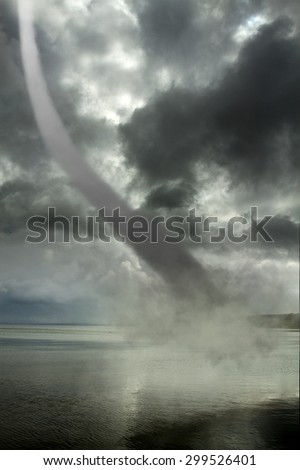 Bad weather and the storm with the wind on the sea. tornado over the ocean