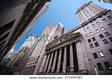 NEW YORK CITY - November 15: Wall Street with New York Stock Exchange in Manhattan Finance district , November 15, 2015 in Manhattan, New York City.