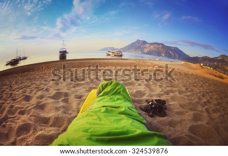 Person sleeping on beach,Cirali Turkey