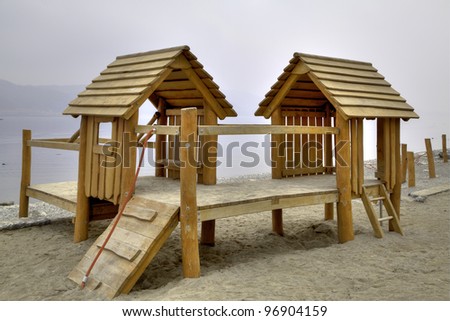 playground with huts at the lakeside promenade in Bodman by the Lake Constance, South Germany
