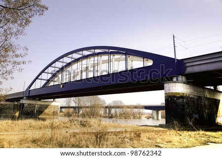 An rail bridge stretches about the river Elbe in Riesa, East-Germany