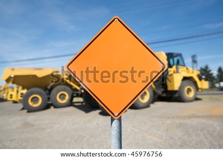 Blank Construction sign against construction site