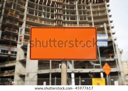 Blank Construction sign against construction site
