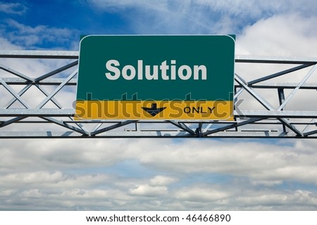 large traffic billboard the word of solution on it