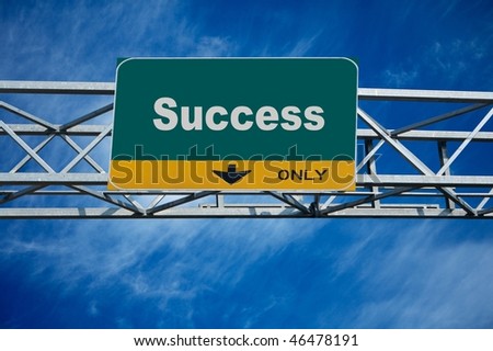 Large traffic billboard the word success on it