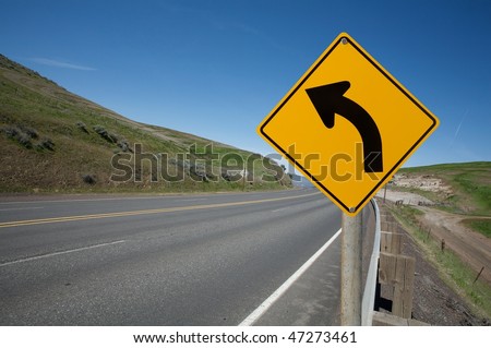 Warning turn left traffic sign