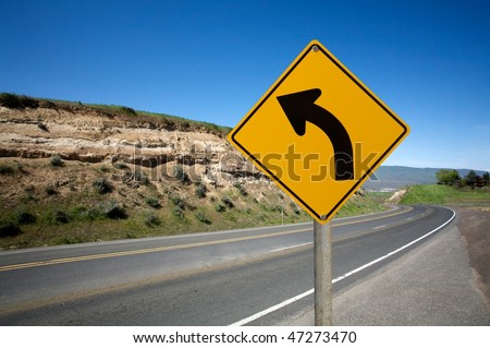 Warning turn left traffic sign
