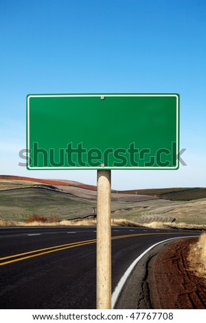 Green traffic sign curve road on background