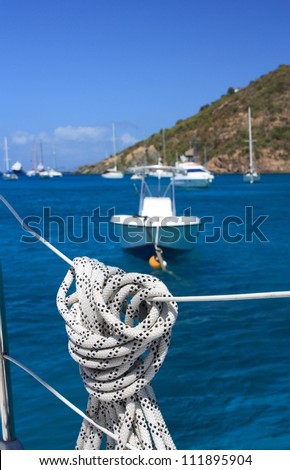 Nautical rope hanging on the sailboat. Detailed parts.