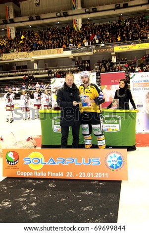 BOZEN, ITALY - JAN 23: Rob Sirianni of team Pustertal gets the MVP award at the Ice Hockey Coppa Italia 2011 at PalaOnda Arena on January  23, 2011, in Bozen, Italy.