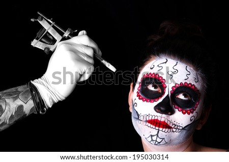 Dead bride woman in skull face art mask. Tattoo artist