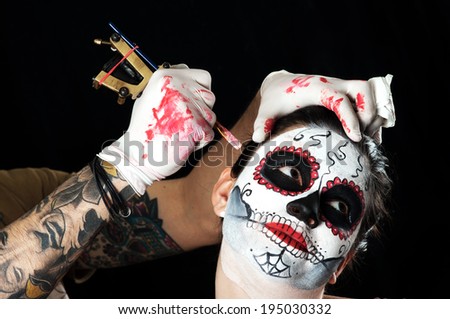 Dead bride woman in skull face art mask. Tattoo artist