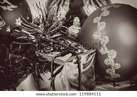 Black and white toned christmas balls and box