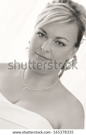 portrait of beautiful smiling bride, black and white tone
